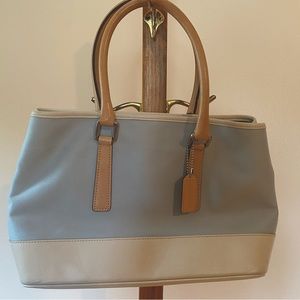 Baby blue and white cream Coach shoulder bag.